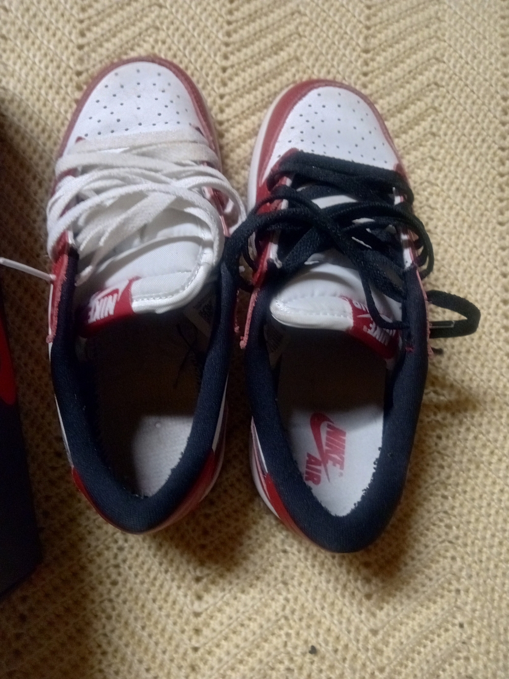 Nike Jordan Low Retros Kids Low-Top Sneakers in White and Red with Black Trim